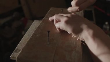The sculptor creates a model of the future sculpture.