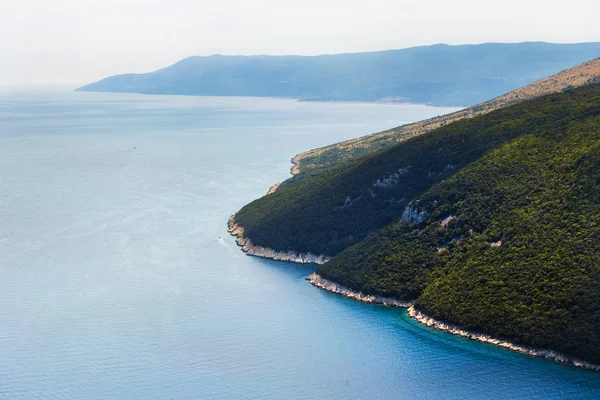 top view of the sea strait or bay without boats and people. Quiet, calm. Croatia, Plomin