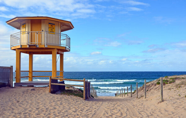 Yellow lifesavers hut on Cronulla beach, Australia