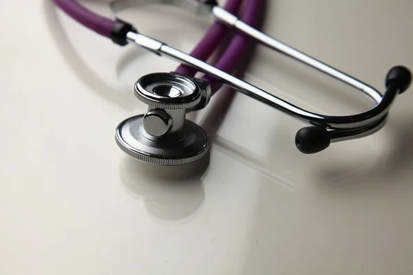 Closeup of a medical stethoscope, isolated on white background — Stock Photo, Image