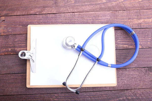 Closeup of a medical stethoscope with folder — Stock Photo, Image