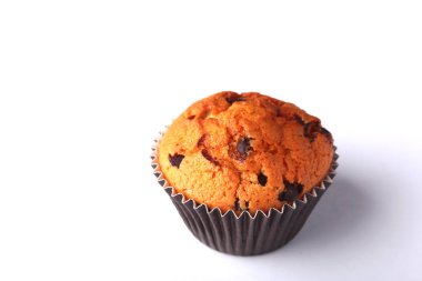 Lezzetli çikolatalı kek, Muffin Beyaz ahşap bir masa üzerinde