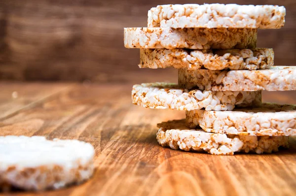 Rice waffles on wooden table