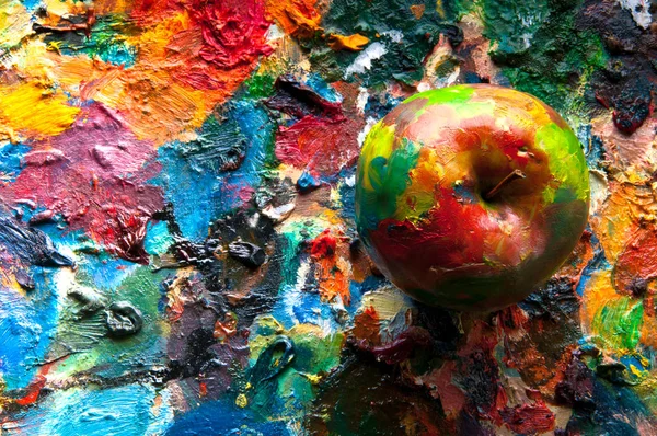 Oil painted apple on colorful background. Abstract. Copyspace