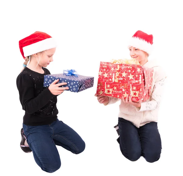 2 teen girl with a New Year gift Royalty Free Stock Photos