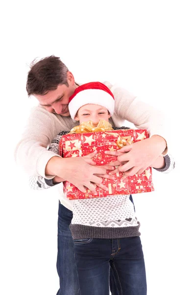 Father and daughter with a Christmas present Stock Photo