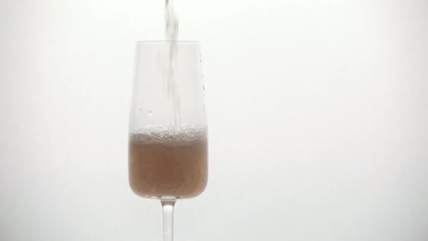 Pours champagne into a glass close-up — Stock Video