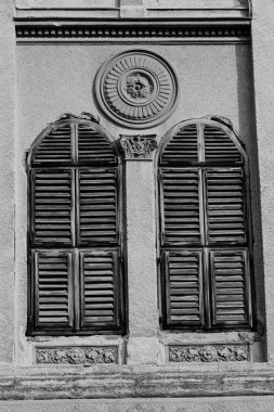 old wooden blinds on the windows