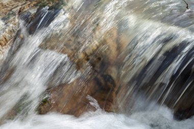 stone under the mountain water, note shallow depth of field