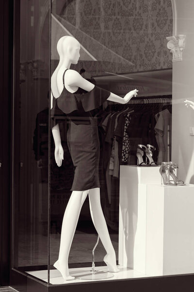 mannequins in a store window