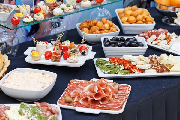 decorated Swedish table with a variety of good food, note shallow depth of field