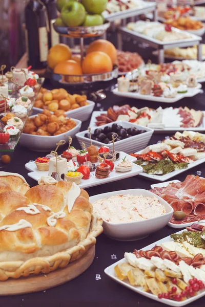 decorated Swedish table with a variety of good food, note shallow depth of field