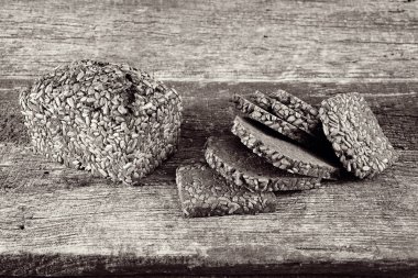 Decoration with slices of rye bread on a wooden board