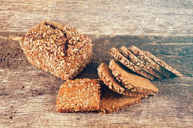 Decoration with slices of rye bread on a wooden board