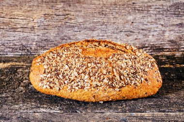 bread with seeds on the wooden board