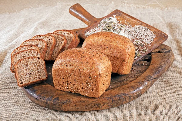 Rye Bread Seeds Wooden Plate — Stock Photo, Image