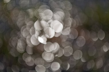 bulanık arkaplan için siyah arkaplan üzerindeki beyaz ışıktan türetilmiş gri soyutlama