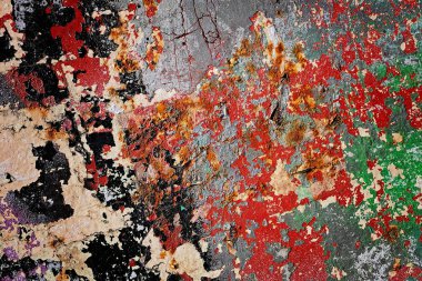 Ruined old wall in various paint residues