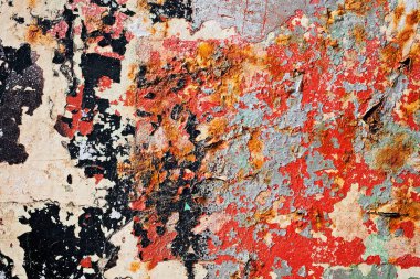Ruined old wall in various paint residues