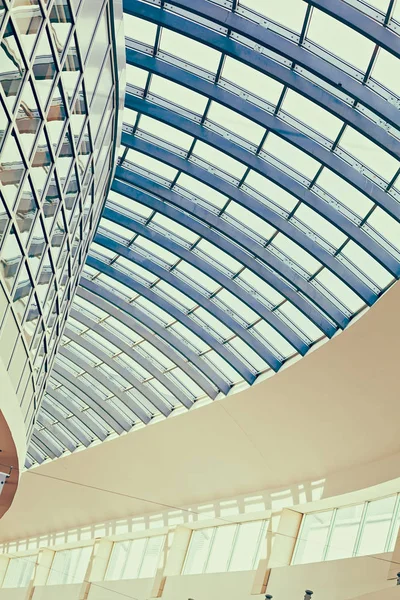 bright interior ceilings with metal frame and glass