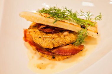 a decorative portion of food on a plate