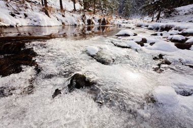clear mountain running water, note shallow depth of field