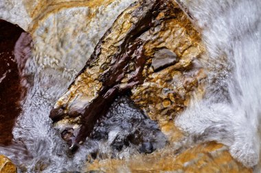 clear mountain running water, note shallow depth of field