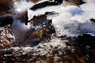 stone under the mountain water, note shallow depth of field