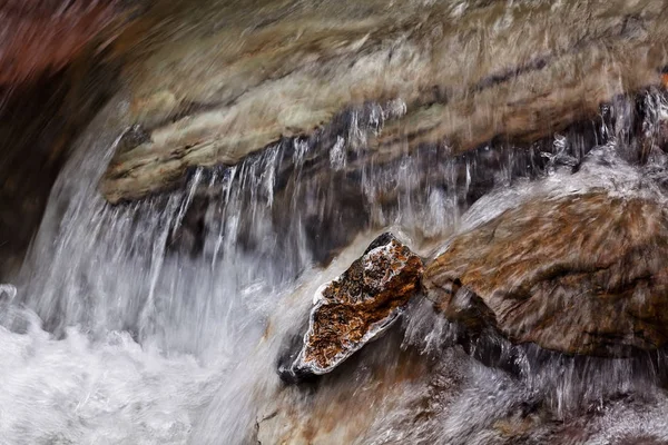 stone under the mountain water, note shallow depth of field