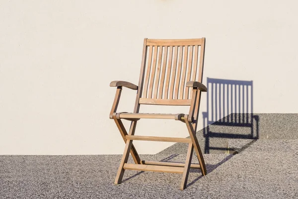 Teak foldable deck chair on terrace — Stock Photo, Image