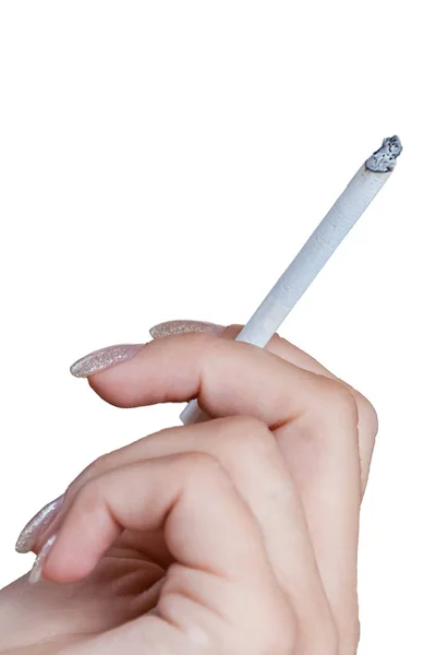 Mão feminina segurando um cigarro isolado no fundo branco — Fotografia de Stock