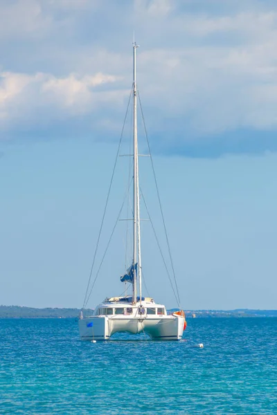 Luxury sailing catamaran in open sea