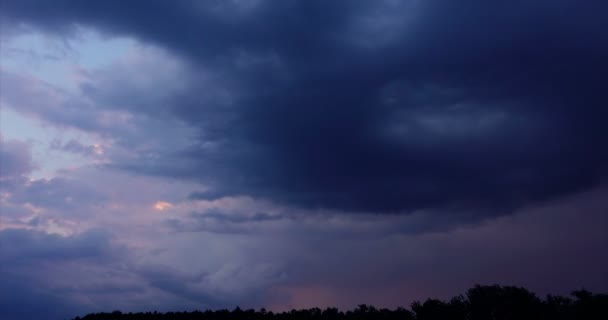 Timelapse of storm clouds from dusk into the night — Stock Video