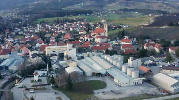 Industrial area in small town in Europe, factory in urban area of Slovenska Bistrica, Gea Oil Factory, aerial view of oil mill and food industry — Stock Photo, Image