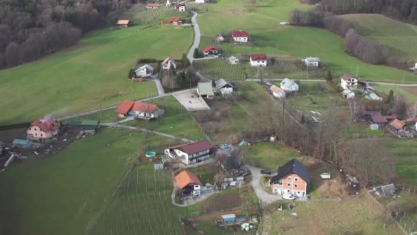 Ugly mixture of different architectural styles in rural countryside of Europe, socialist style houses destroying scenic Alpine landscape — 비디오