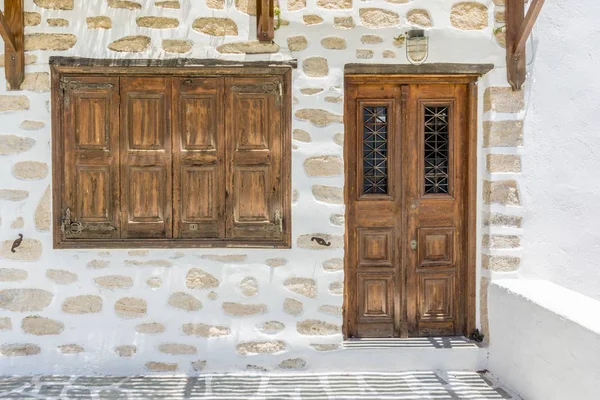 Traditional wood door and window in the cyclades islands. greek — Stock Photo, Image