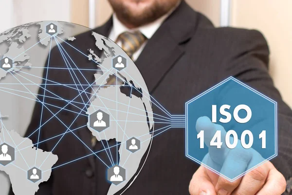 The businessman is choosing ISO  14001 on the touch screen — Stock Photo, Image