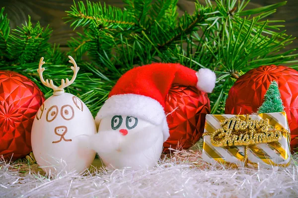 Santa Claus and Christmas deer on Christmas .Unusual eggs — Stock Photo, Image