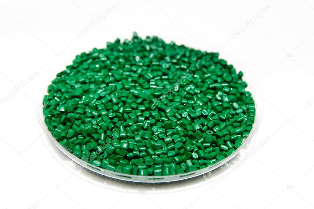 Plastic pellets green. Colorant for polymers in granules.