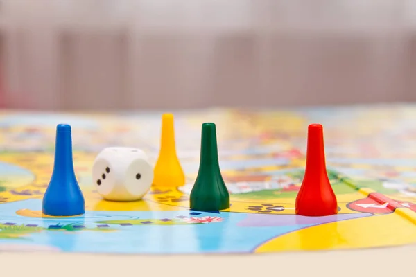 Board games for the home. Yellow, green and red plastic chips an — Stock Photo, Image