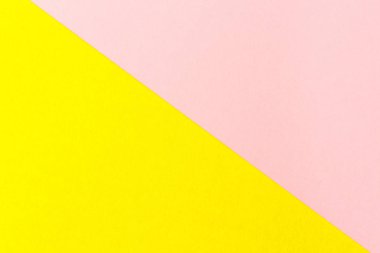 Sarı ve pembe kağıt doku arka plan rengi. Trend renkler, kağıdın geometrik arka plan. Renkli yumuşak kağıt arka plan. Pastel renk.