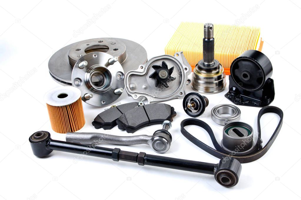 Auto parts background. Hub, pump, brake pads, filter, timing bel