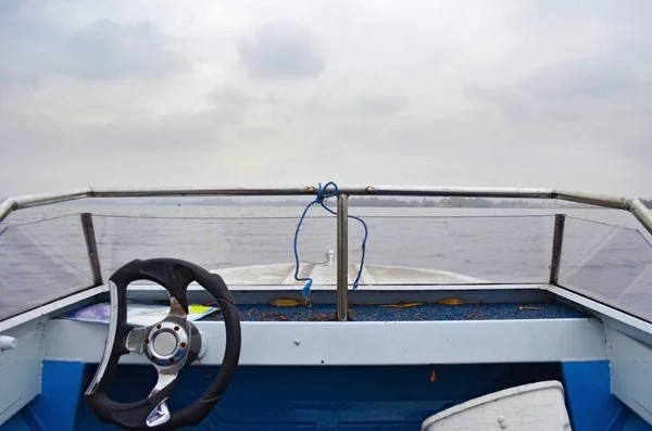 Motor boat cockpit with wheel