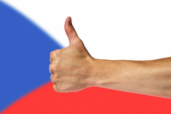 Великі пальці вгору на тлі прапор Чехії — стокове фото