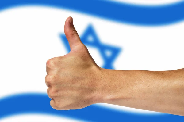 Başparmak yukarıya üstünde bir arka plan İsrail bayrağı — Stok fotoğraf