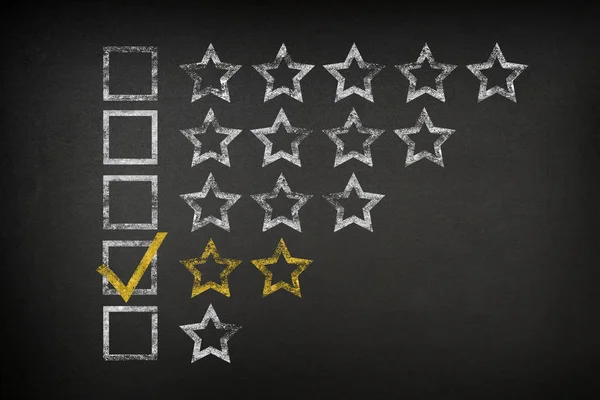 Two Star Checklist Rating On Blackboard — Stock Photo, Image
