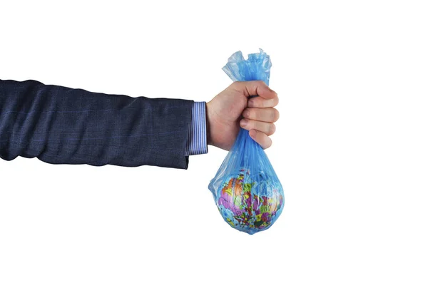 The human hand holds the earth globe in a plastic bag. Plastic pollution of the planet. Concept of environmental pollution and earth day — 스톡 사진