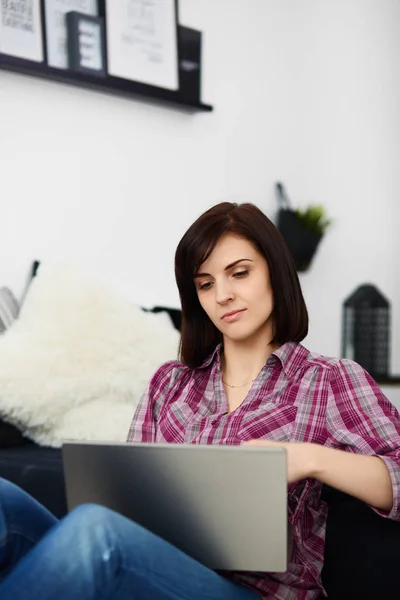 Young freelancer woman using laptop.