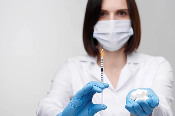 Diabetes,insulin,high blood sugar. Medical injection,diseases,health care.Doctor or nurse in hospital holding a syringe with liquid vaccines preparing to do an injection.People in white uniform,robe — Stock Photo, Image