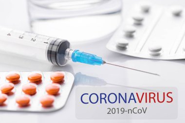 Coronavirus 2019-nCoV. Novel coronavirus, Middle East Respiratory Syndrome. Pills with CORONAVIRUS text. Chinese coronavirus outbreak. Virus Pandemic Protection Concept